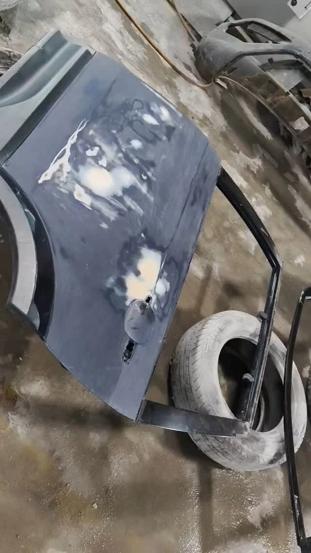 Vehicle panels being prepared for bodywork at Tefnut