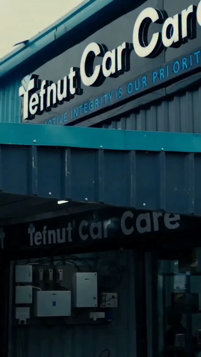 Tefnut Car Care workshop facade with original white signage and turquoise trim